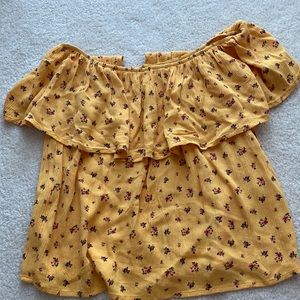 Hollister Women’s top on size Small. Yellow with flower details.